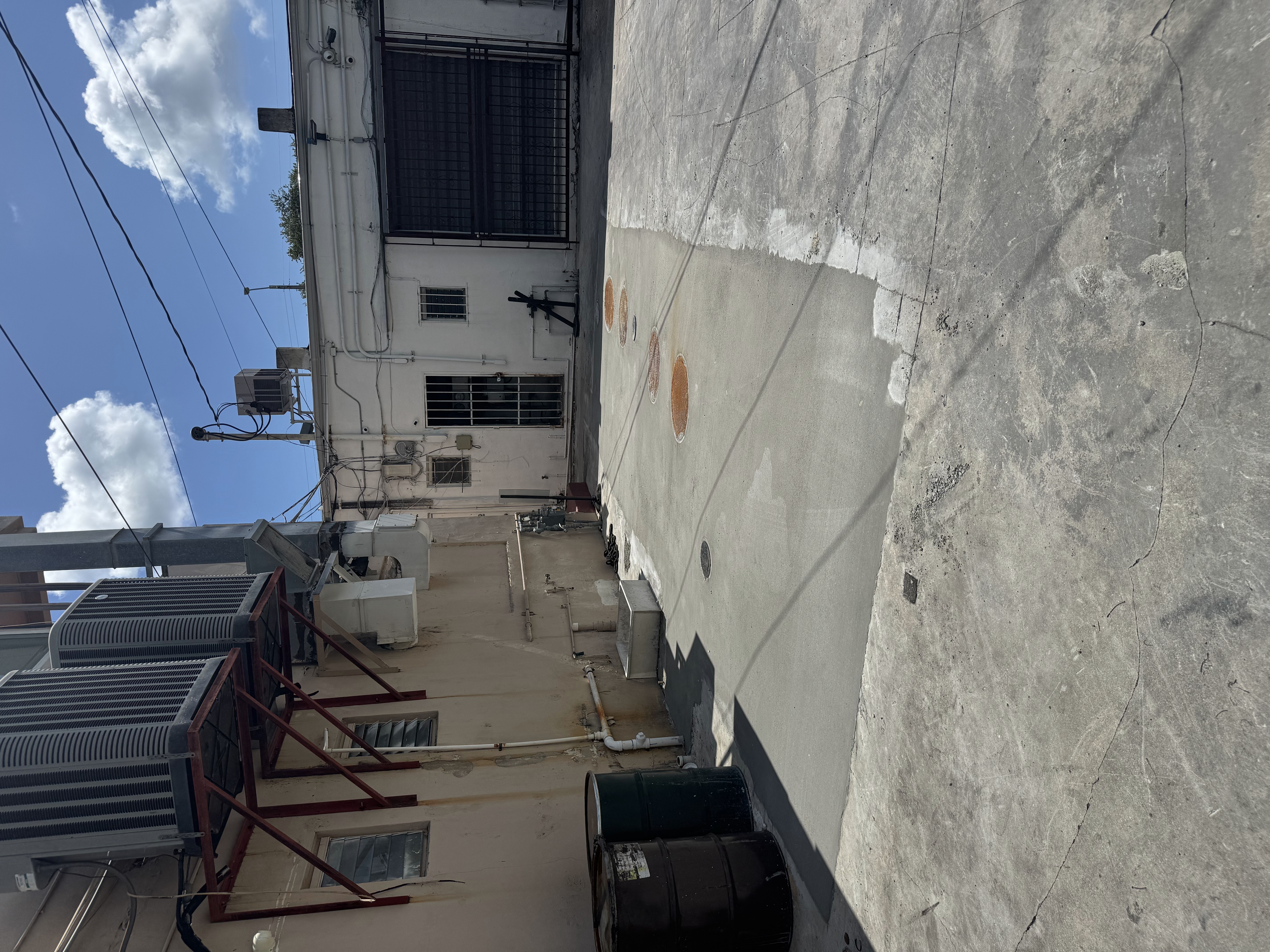 Completed concrete surface and grease interceptor access covers